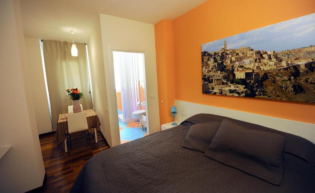 Letto o letti in una camera di amaranto bnb