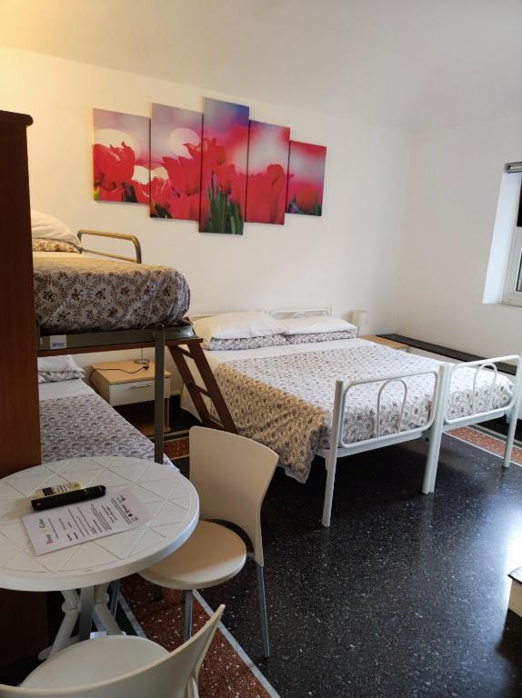Postel nebo postele na pokoji v ubytování Hotel Caffaro