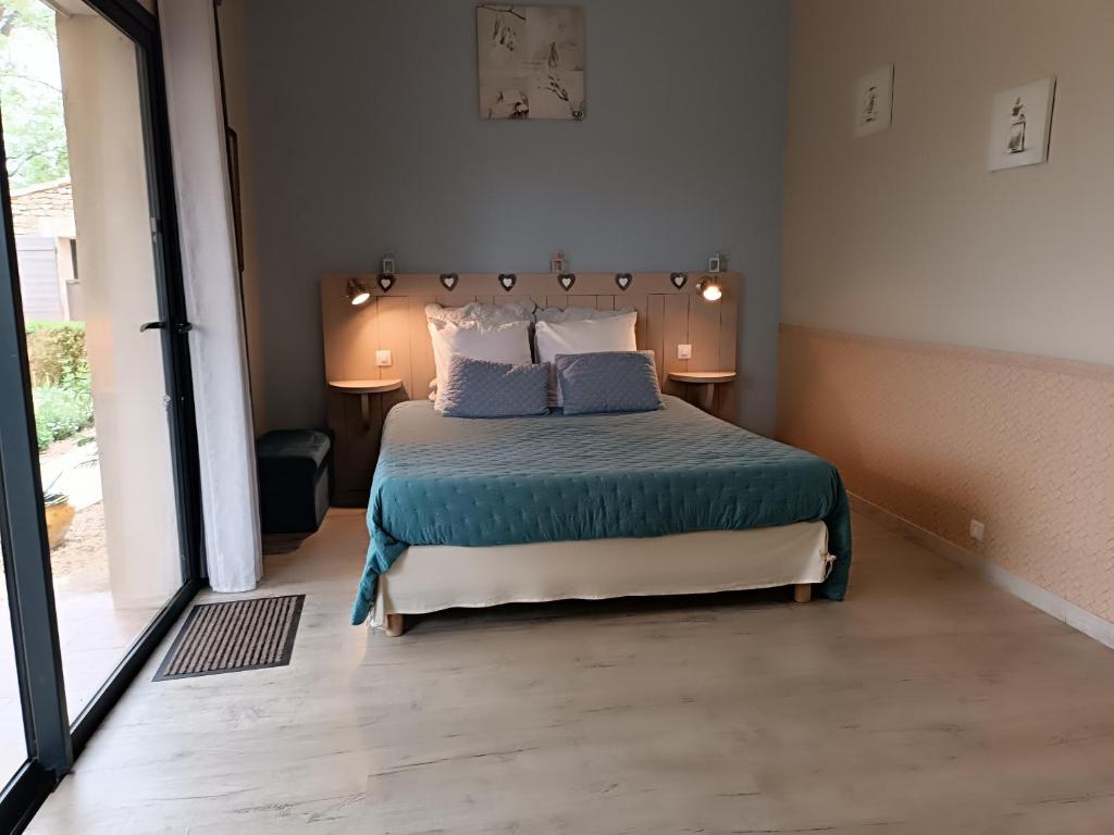 Postel nebo postele na pokoji v ubytování Mas Auroma