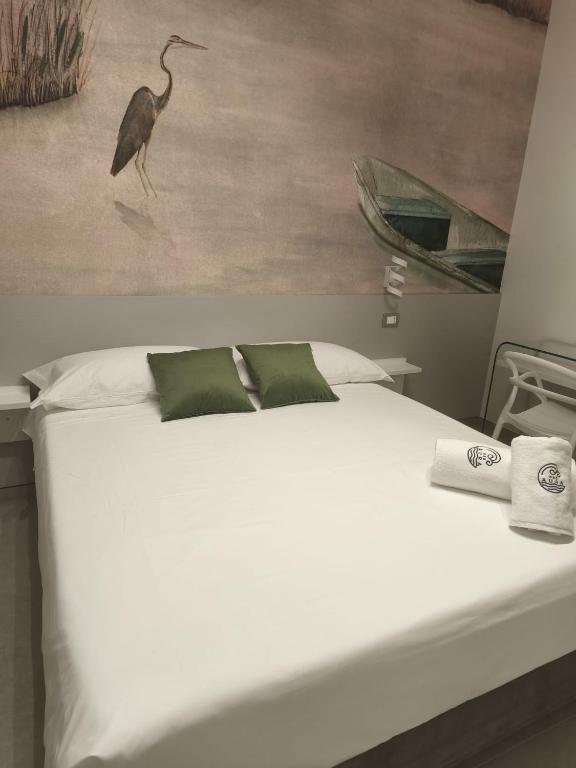 Postel nebo postele na pokoji v ubytování B&B Aura