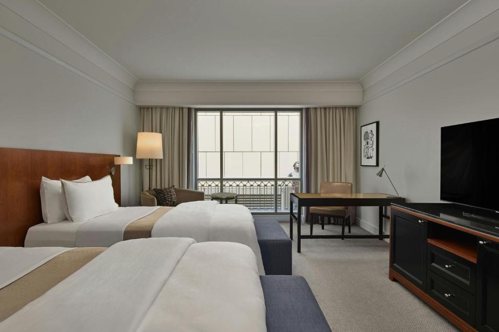Postel nebo postele na pokoji v ubytování The Westin Melbourne