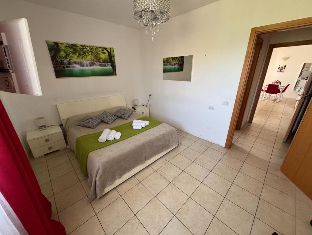 Postel nebo postele na pokoji v ubytování Casa SAFFI