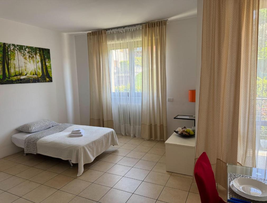 Postel nebo postele na pokoji v ubytování Casa SAFFI