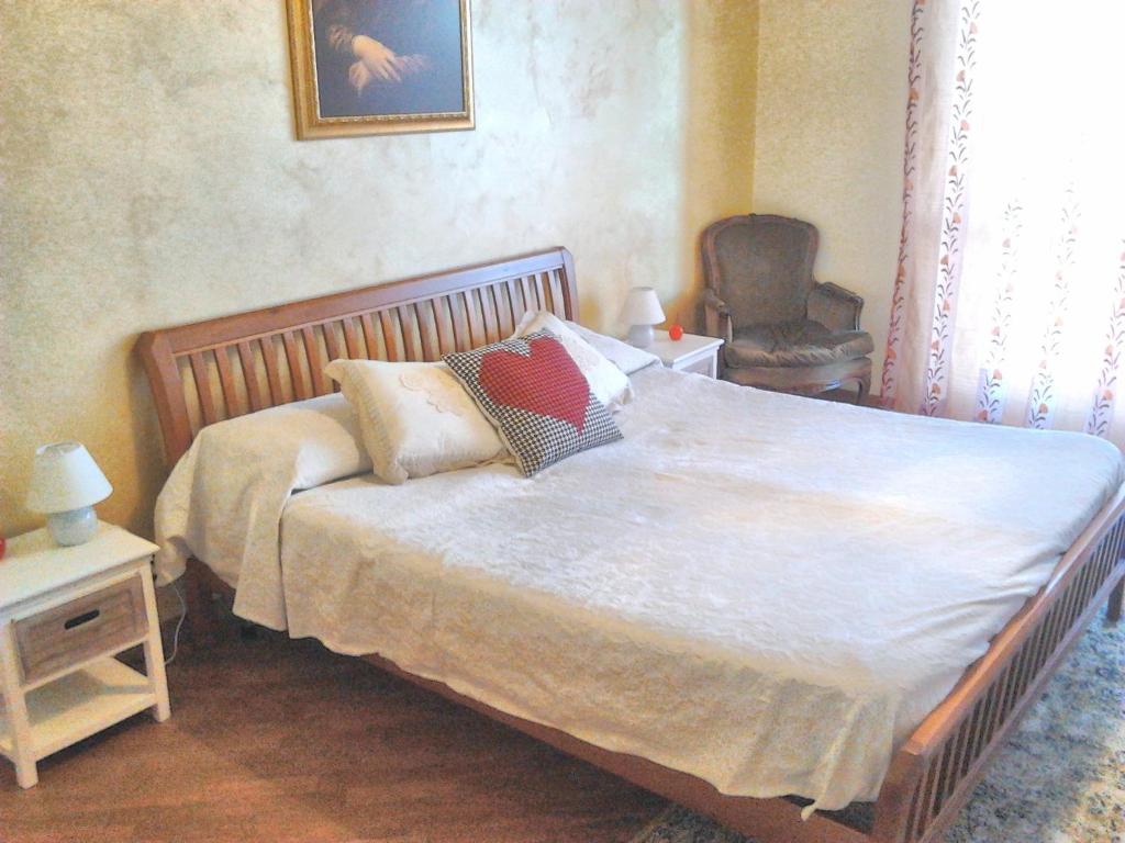 Postel nebo postele na pokoji v ubytování Luna del Belvedere