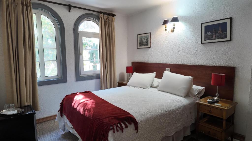 Postel nebo postele na pokoji v ubytování Chilhotel en Providencia