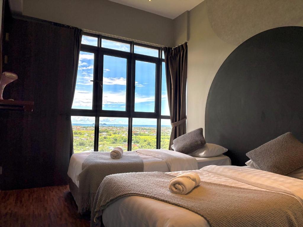 Ένα ή περισσότερα κρεβάτια σε δωμάτιο στο Kavenue Modern Room by CSE