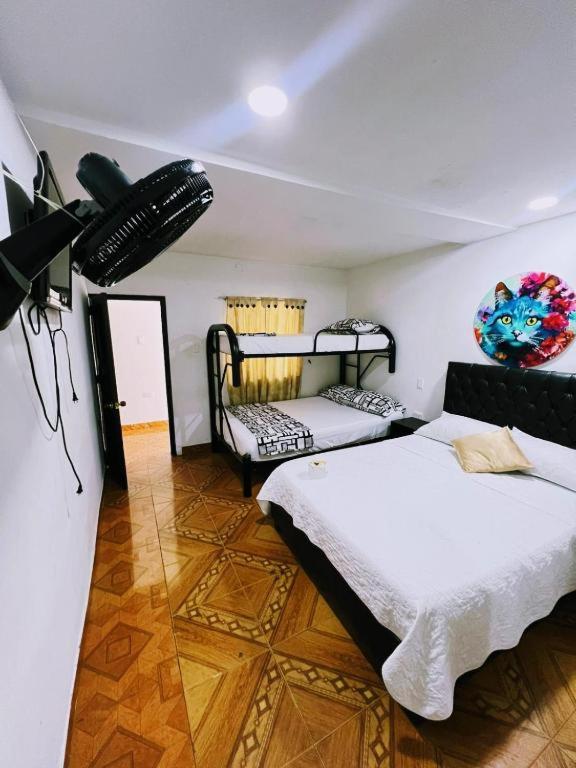 Postel nebo postele na pokoji v ubytování Hotel Zipa Villeta - Sede Tradicional