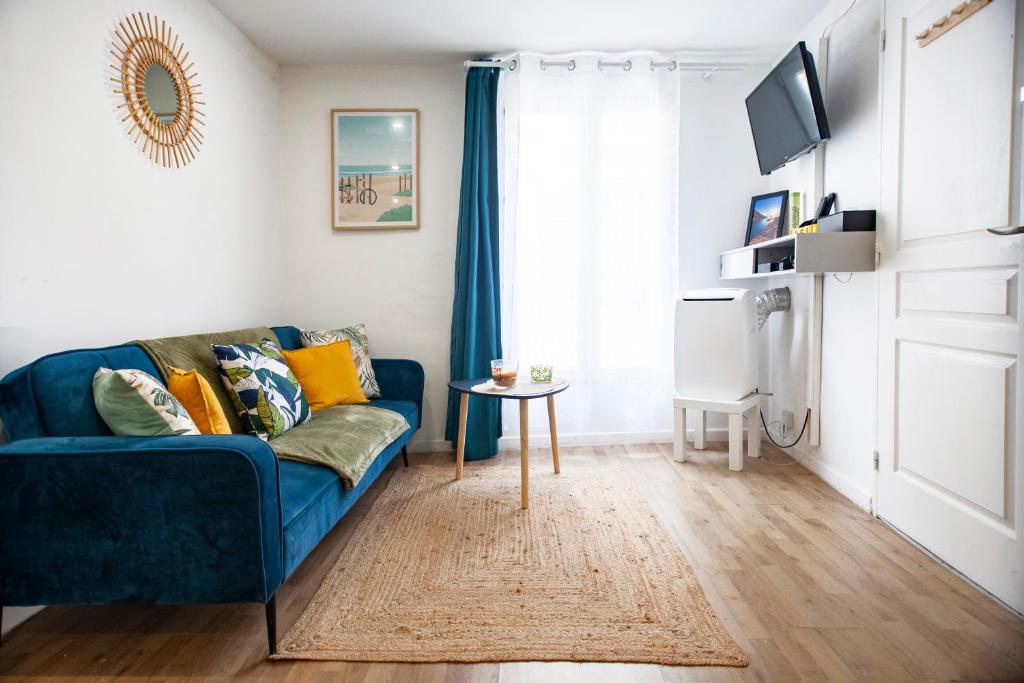 Et tv og/eller underholdning på Cosy et moderne, centre-ville