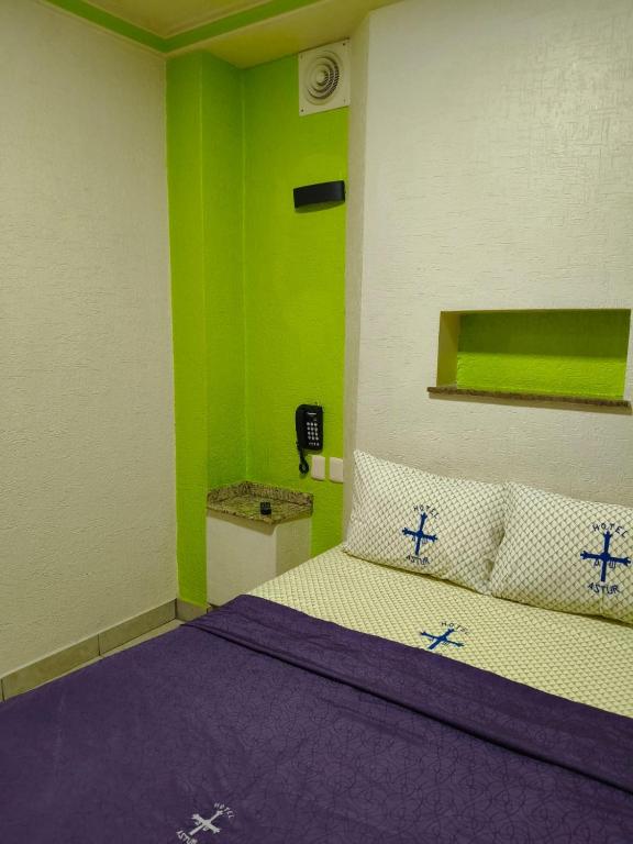 Postel nebo postele na pokoji v ubytování Hotel Astur