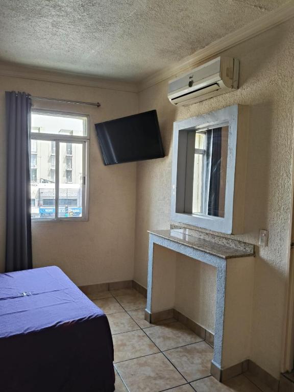TV a/nebo společenská místnost v ubytování Hotel Astur