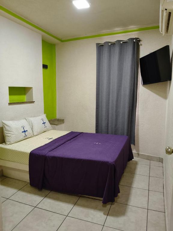Postel nebo postele na pokoji v ubytování Hotel Astur