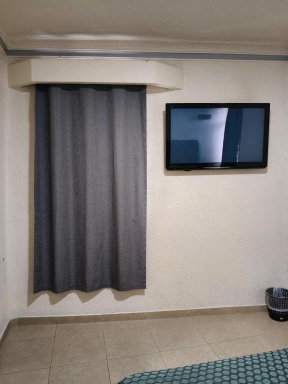 TV a/nebo společenská místnost v ubytování Hotel Astur