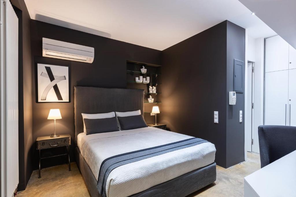 A bed or beds in a room at Ma Maison N5, Private Heated Pool, Acropolis View