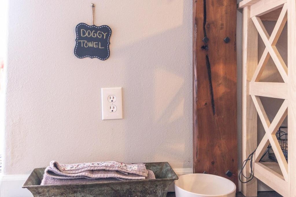 a bathroom with a sink and a toilet and a shelf at 2 spaces More Space with 2 units at same location PNW Retreat in Philomath