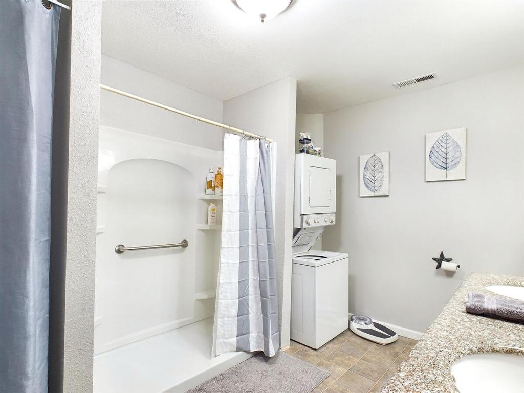 a bathroom with a shower and a toilet at 2 spaces More Space with 2 units at same location PNW Retreat in Philomath