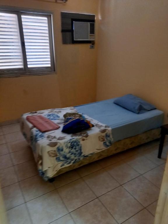 Postel nebo postele na pokoji v ubytování Fortaleza 2