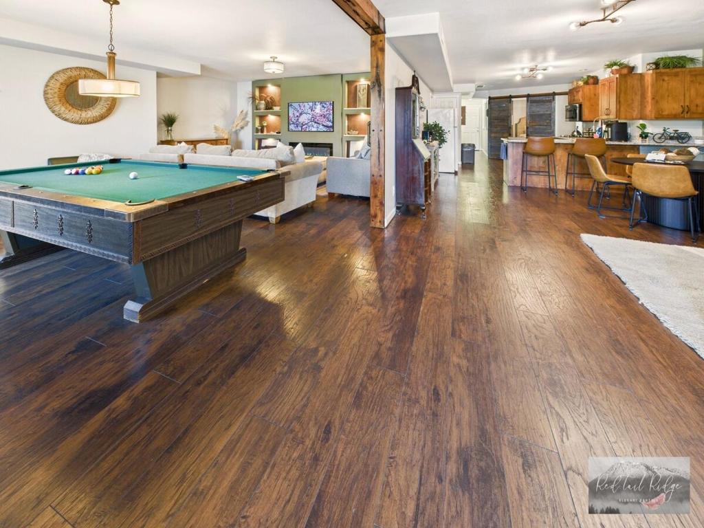 a living room with a pool table in the middle at 2 spaces More Space with 2 units at same location PNW Retreat in Philomath