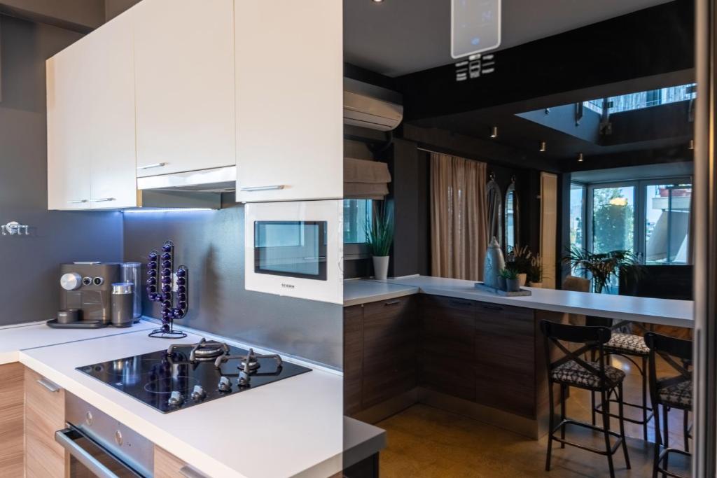 A kitchen or kitchenette at Ma Maison N5, Private Heated Pool, Acropolis View