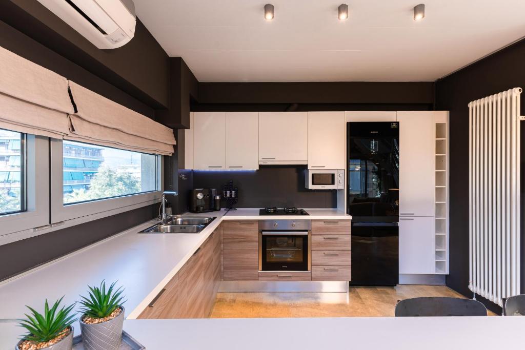 A kitchen or kitchenette at Ma Maison N5, Private Heated Pool, Acropolis View