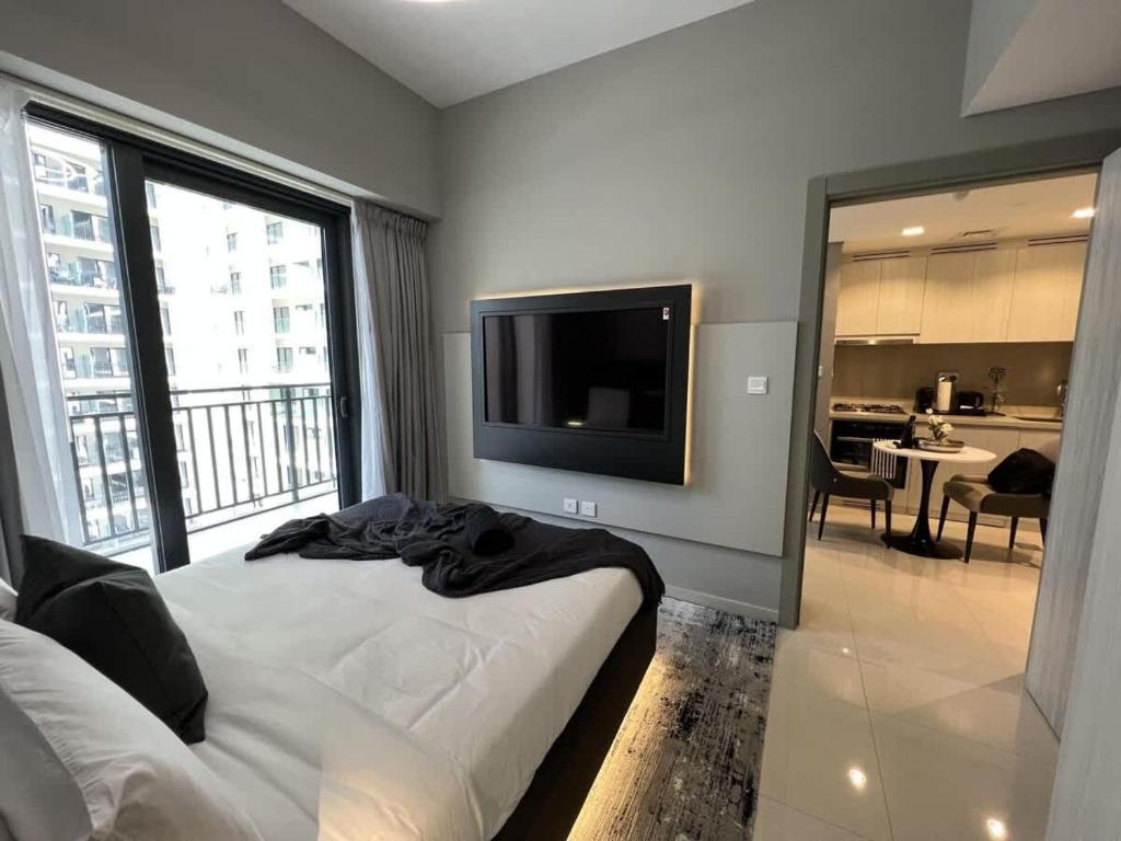 Postel nebo postele na pokoji v ubytování Quasi-Hotels Zada Cozy Lux in Business Bay 1BR