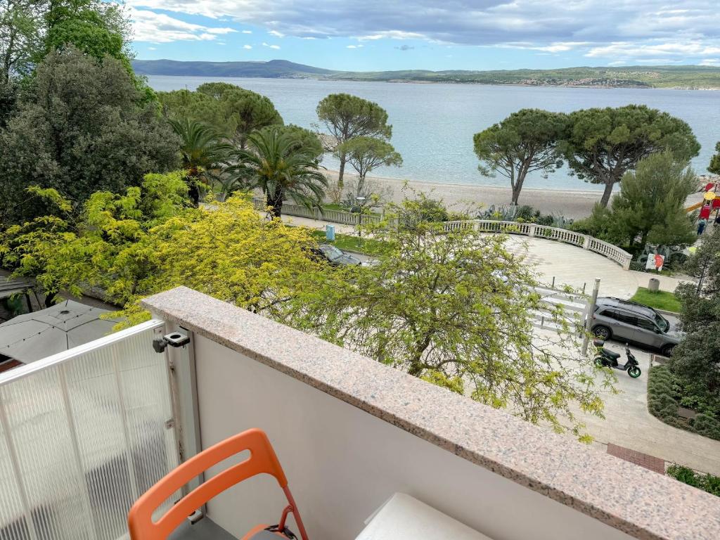 a balcony with a view of the water at Apartment Romeo in Crikvenica