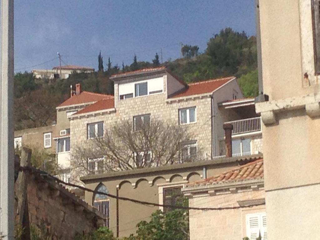 a group of buildings on top of a hill at Main Bus Terminal Rooms in Dubrovnik