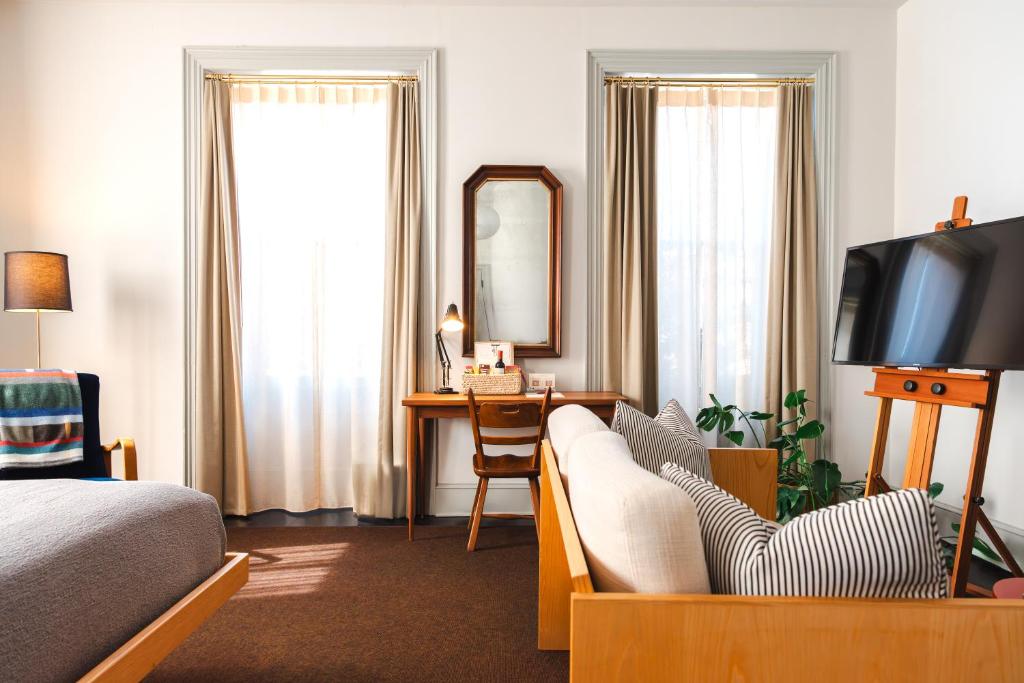 Postel nebo postele na pokoji v ubytování Hotel Kinsley