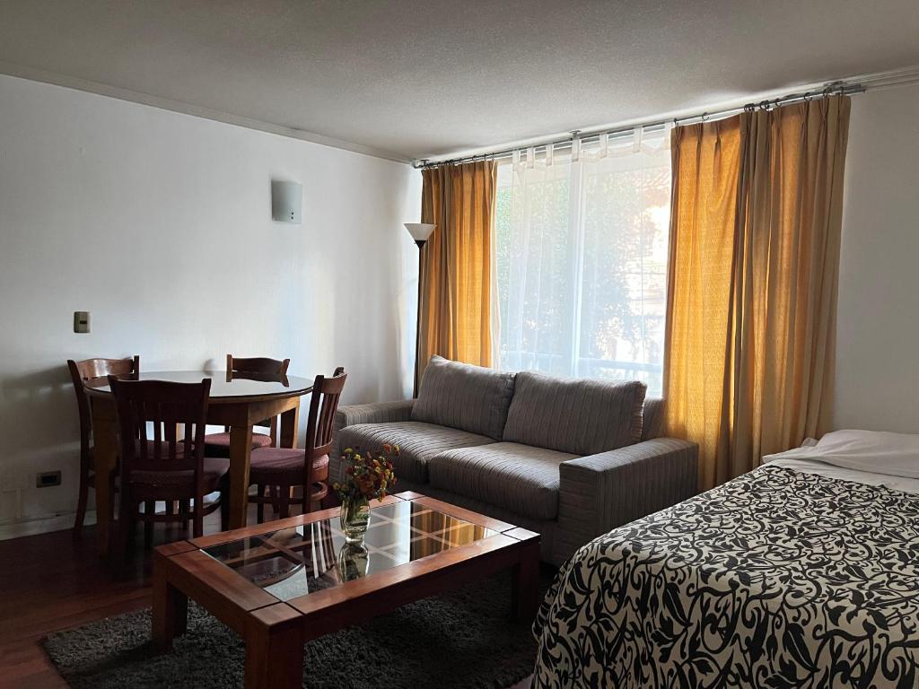 Postel nebo postele na pokoji v ubytování Chilhotel en Providencia