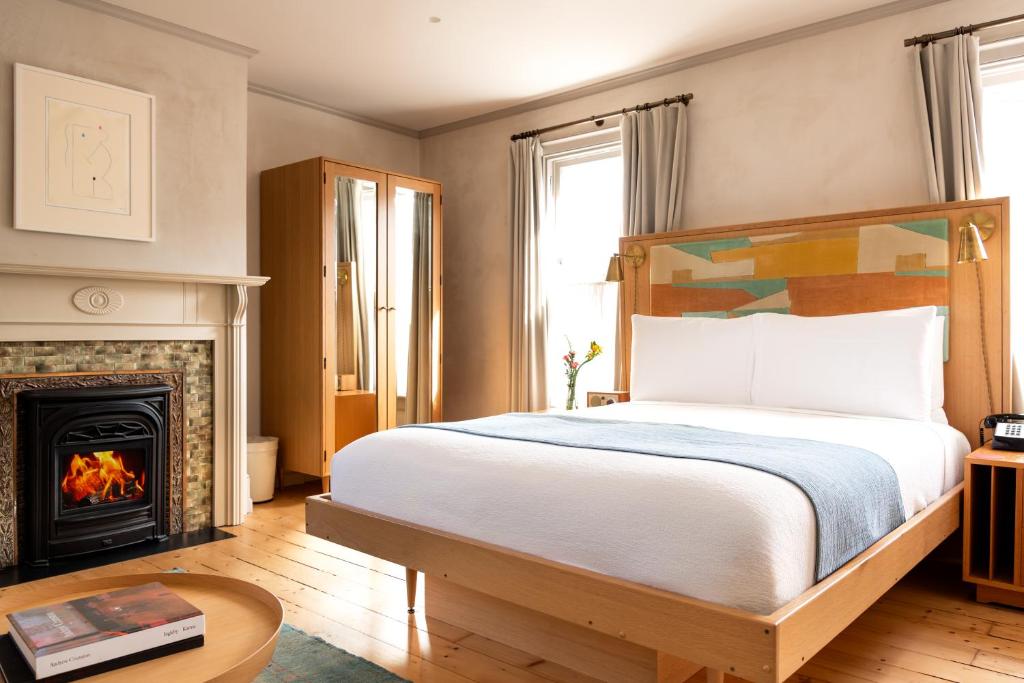 Postel nebo postele na pokoji v ubytování Hotel Kinsley