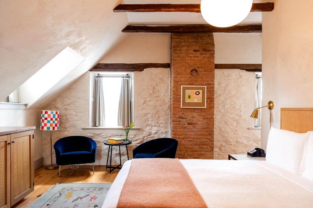 Postel nebo postele na pokoji v ubytování Hotel Kinsley