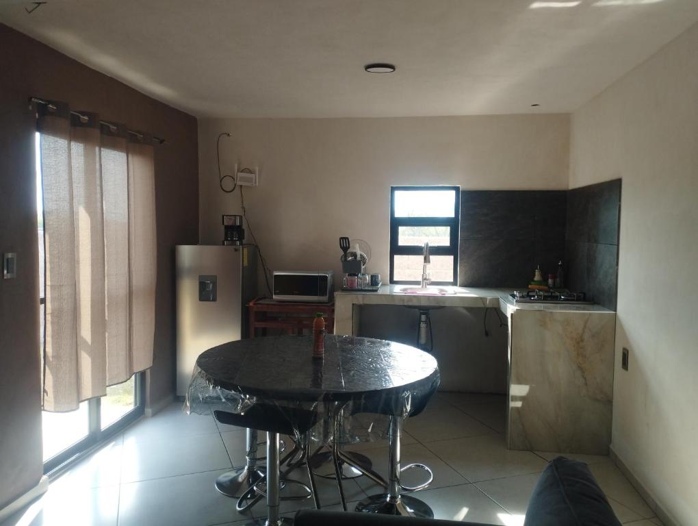 Una cocina o cocineta en Jacarandas