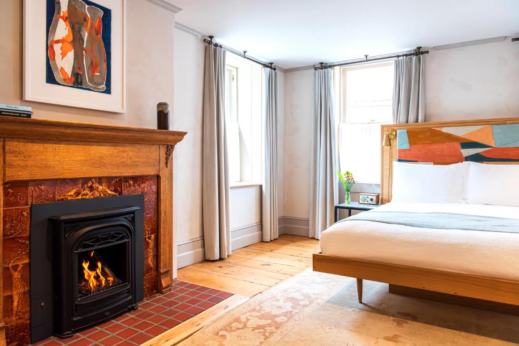 Postel nebo postele na pokoji v ubytování Hotel Kinsley