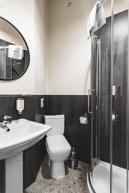 Koupelna v ubytování Aparthotel Stara Przędzalnia