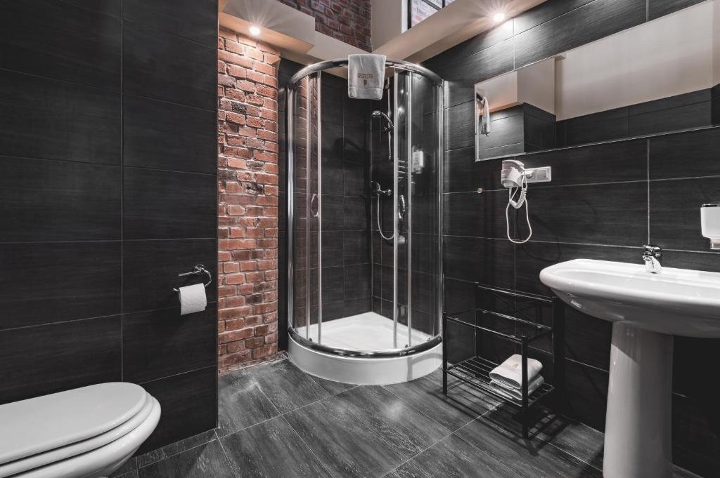 Koupelna v ubytování Aparthotel Stara Przędzalnia