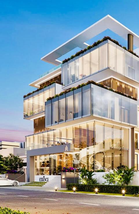 a large building with a lot of windows at The Essence Studios, Accra Kotoka Airport in Accra