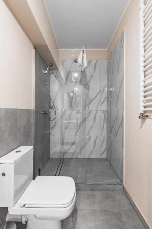 Koupelna v ubytování Aparthotel Stara Przędzalnia
