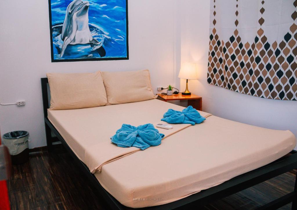 Postel nebo postele na pokoji v ubytování Ananas Guesthouse