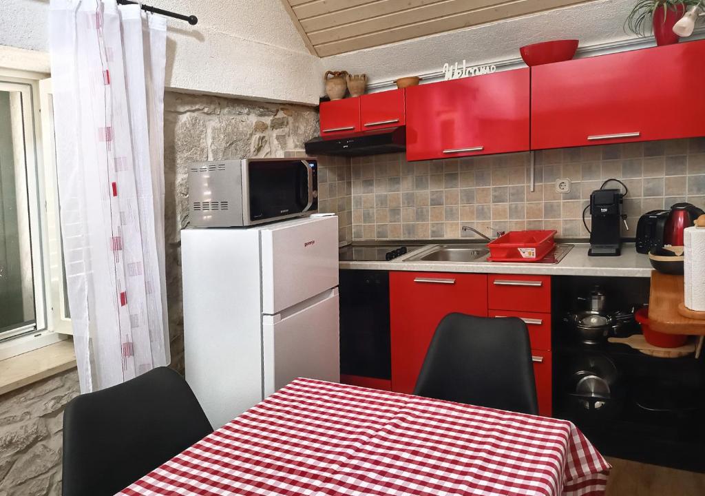 Kuchyň nebo kuchyňský kout v ubytování apartment GLORIA - old city center