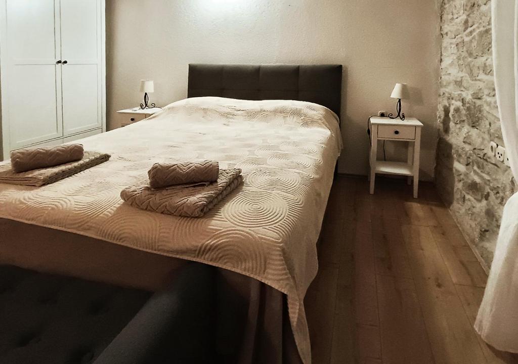 Postel nebo postele na pokoji v ubytování apartment GLORIA - old city center