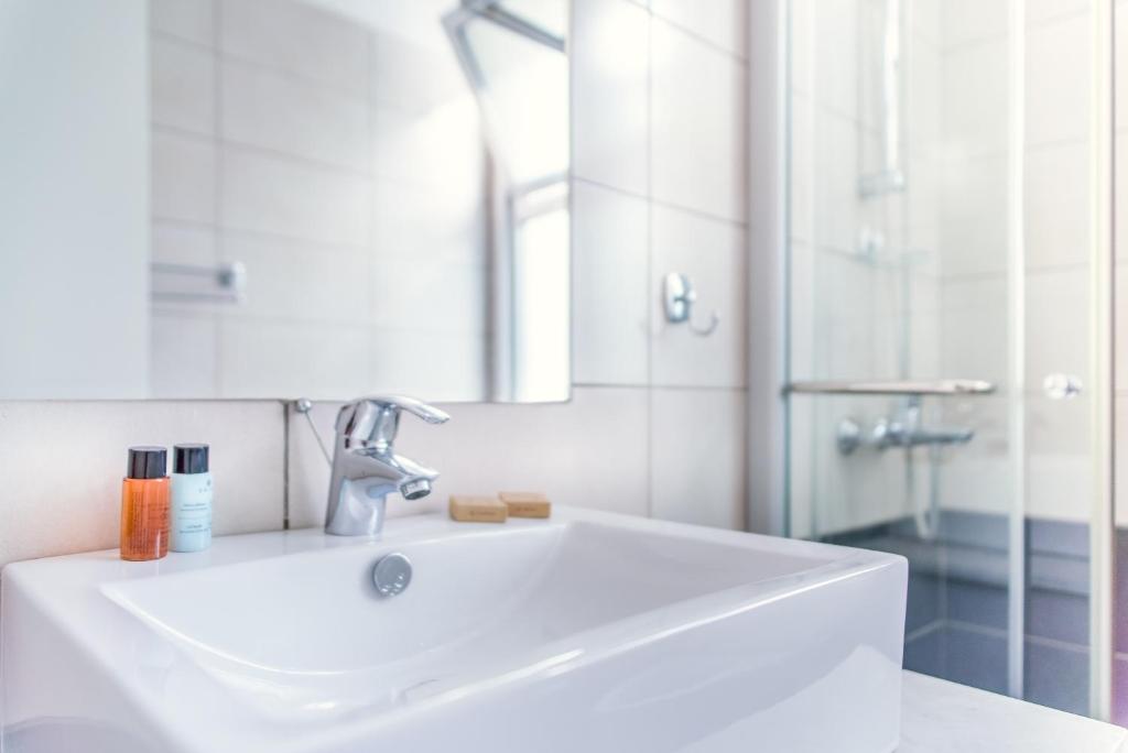 Koupelna v ubytování Napian Suites