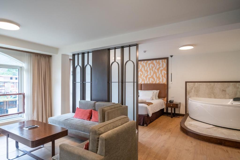 Postel nebo postele na pokoji v ubytování Hotel Taypikala Machupicchu