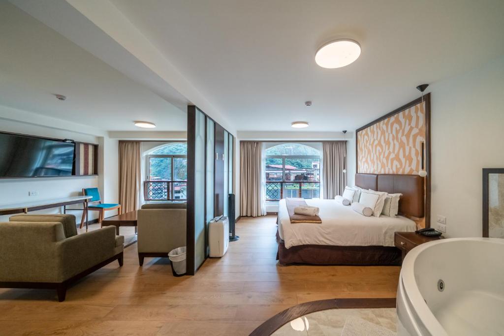 Postel nebo postele na pokoji v ubytování Hotel Taypikala Machupicchu