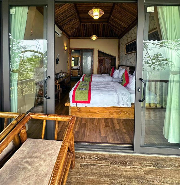 Postel nebo postele na pokoji v ubytování Chapa Ecolodge