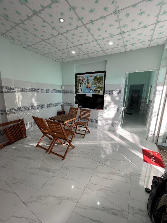 TV a/nebo společenská místnost v ubytování HOMESTAY Cát Tiên