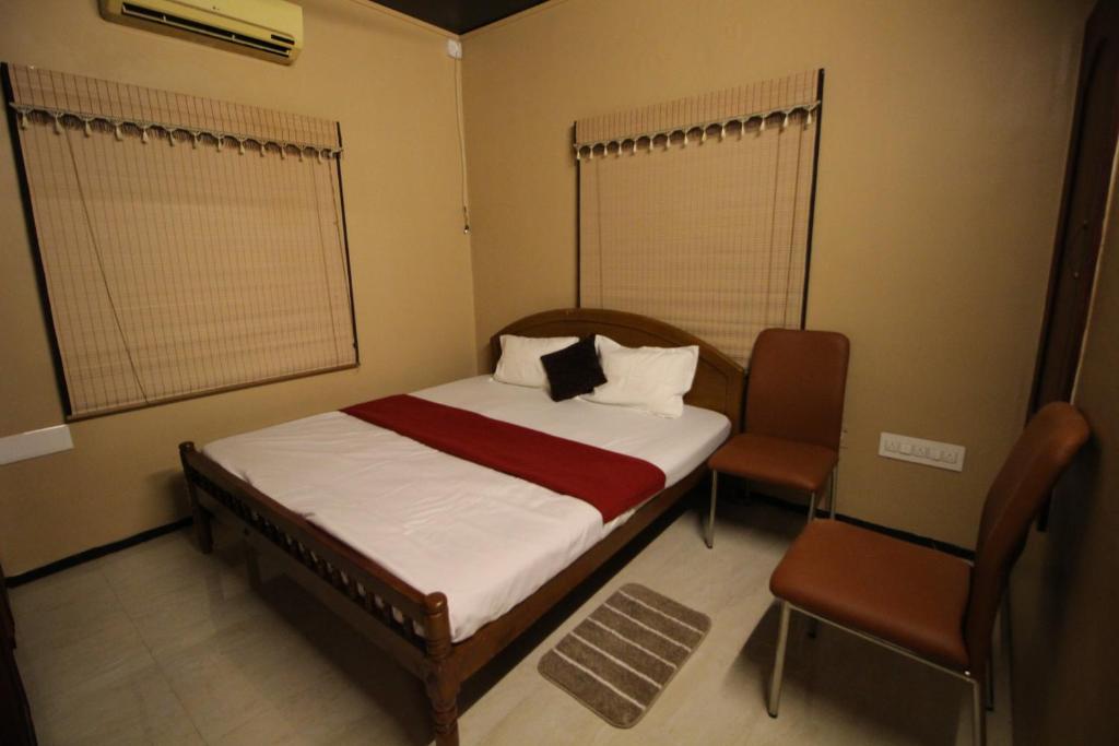 Postel nebo postele na pokoji v ubytování A2A Hotel
