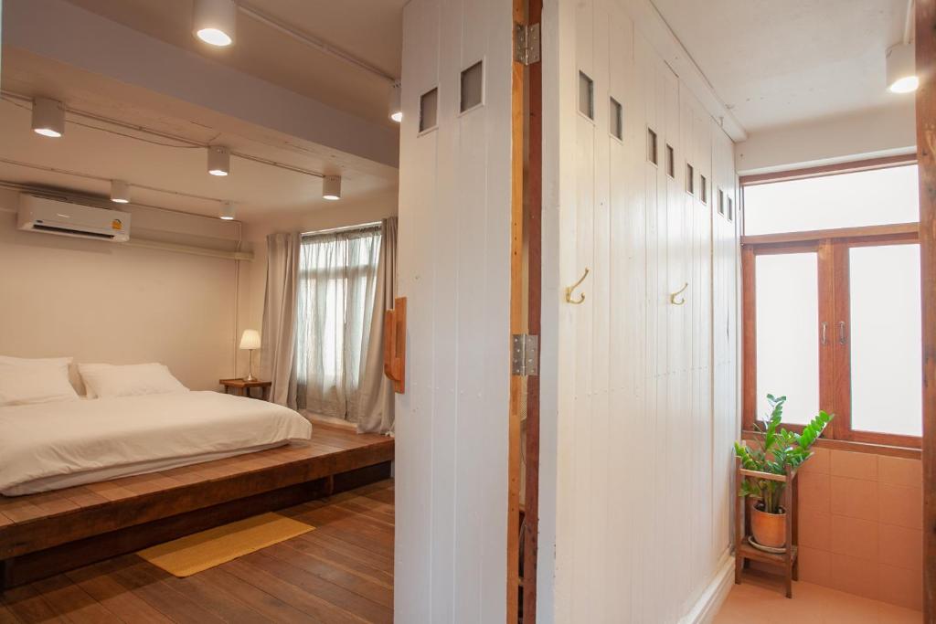 Postel nebo postele na pokoji v ubytování Mana Craft Stay
