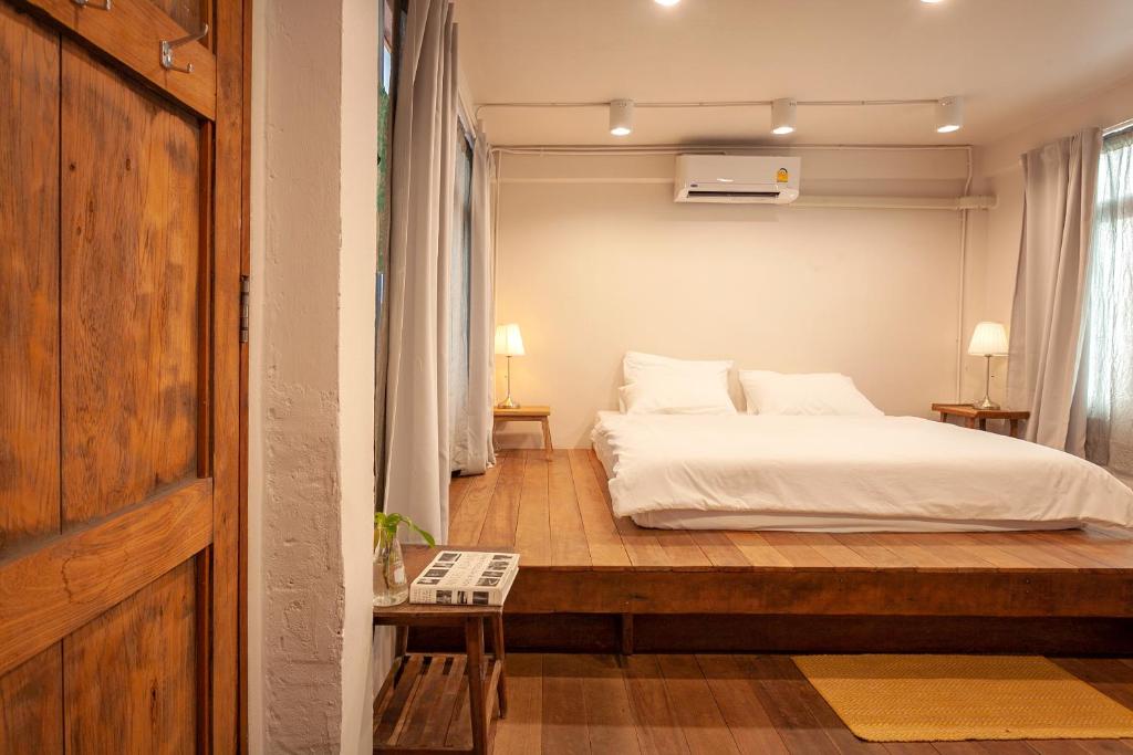Postel nebo postele na pokoji v ubytování Mana Craft Stay