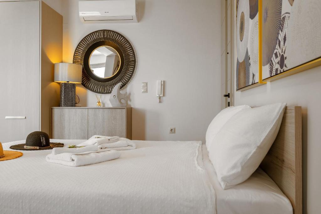 A bed or beds in a room at Ioanna Endless Blue Studio