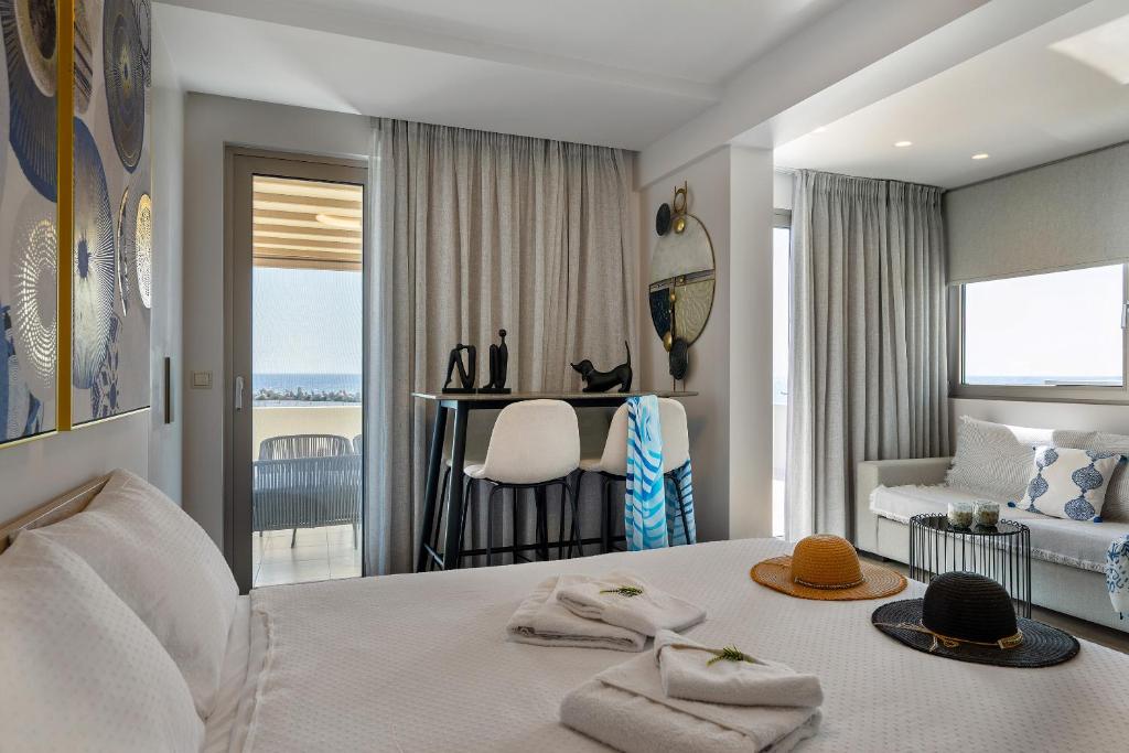 A bed or beds in a room at Ioanna Endless Blue Studio