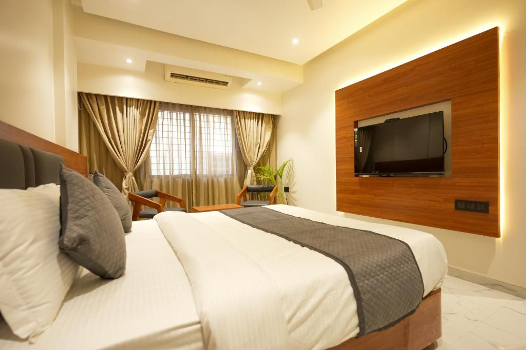TV a/nebo společenská místnost v ubytování Hotel Sai Kamal